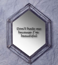 Mirror with 'Don't hate me because I'm beautiful' written on it