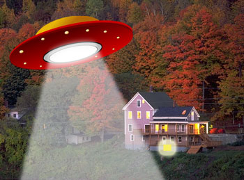 House at night with UFO