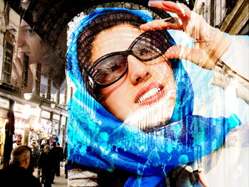 Woman in headscarf and sunglasses in Syrian market