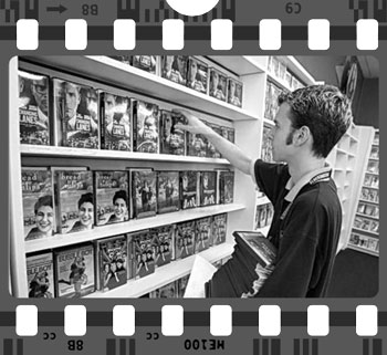 Video store clerk on a film strip