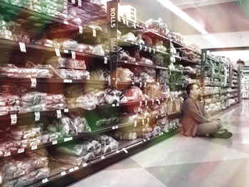 Man in bread aisle with swirling lights