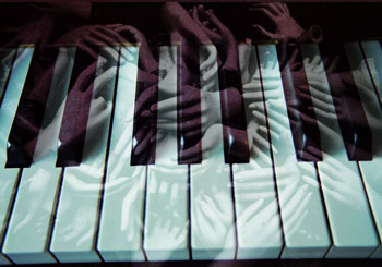 Keyboard with superimposed hands