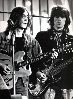 John Lennon performing with Keith Richards