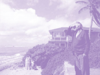 Old man looking at horizon in front of beach house