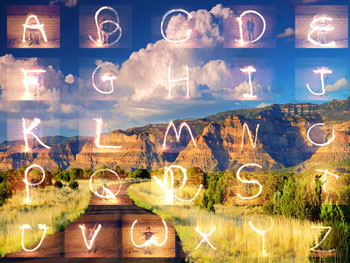 Landscape with superimposed alphabet in light