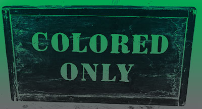 Colored only sign with green