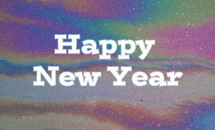 Happy New Year on rainbow oil background