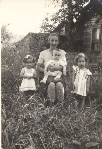 b&amp;amp;amp;amp;amp;amp;w photo of family on grassy lawn