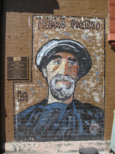 Mural painting of old man by De La Vega in Harlem, NYC, photo by Alyce Wilson