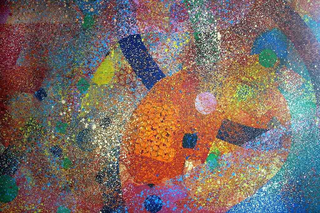 Abstract painting with pointilism. Background is bluish, with red, purple, yellow, orange and red shapes.