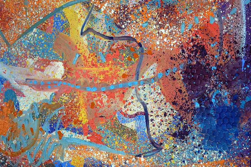 An abstract painting with pointilism and large abstract shapes. There are fields of light blue, yellow, orange, red, white, and purple. A squiggly "X" crosses the painting to the right of center.