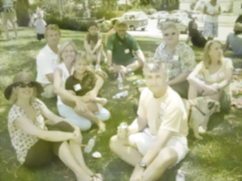 Family picnic, blurry and filled with light